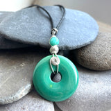 Handmade Chrysoprase green gemstone pendant in a sterling silver setting by The Spiral Rock