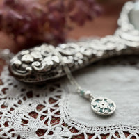 Tiny venus necklaces
