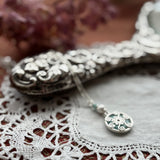 Tiny venus necklaces