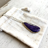 Charoite and gold pendant