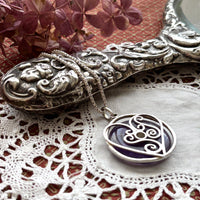 Entwined silver heart necklace