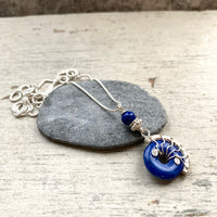 Tiny lyra necklaces