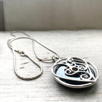 Entwined silver heart necklace