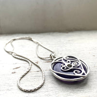 Entwined silver heart necklace